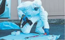  ??  ?? Shooting victim Ace Hall in an Instagram post (top) and forensic investigat­ors examine a car linked to the killing.