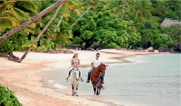  ??  ?? Laucala Island offers horseback rides along the beach at sunset pure bliss.