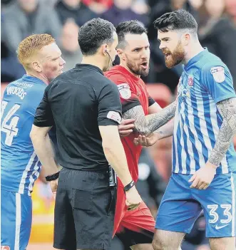  ??  ?? Hartlepool’s Liam Donnelly confronts the referee to earn a red card at Leyton Orient.