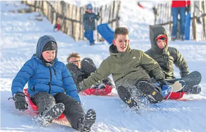  ?? Pictures: Steven Brown. ?? Nine-year-old Finlay Young leads the sledging race on the lower slopes.