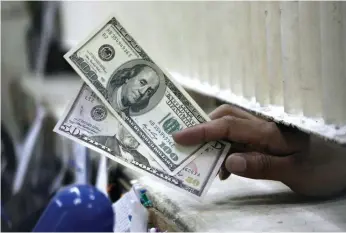  ?? Reuters ?? The dollar has fallen to more than three-month lows against a basket of major currencies