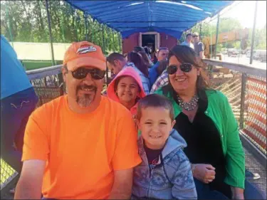  ?? PATRICIA DOXSEY — DAILY FREEMAN ?? John and Stacy Golemis of Stony Point brought their children, Evan, 5, and Hayden, 8, to Kingston Saturday for a ride on the steam train.