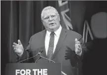  ?? CP PHOTO ?? Ontario Premier Doug Ford speaks to reporters, in Toronto, on Monday.