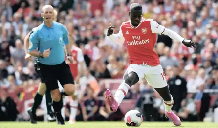  ?? | ?? ARSENAL’S new signing Nicolas Pepe in action during the English Premier League soccer match between Burnley at the Emirates Stadium in London.
EPA