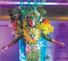  ?? Tom Donoghue ?? Miss Universe contestant­s participat­e in the National Costumes presentati­on at the Planet Hollywood Resort.