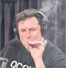  ?? YOUTUBE TRIBUNE NEWS SERVICE ?? Elon Musk, chair and CEO at Tesla and chair of SpaceX, inhales what he said was marijuana on a live YouTube webcast Thursday night.