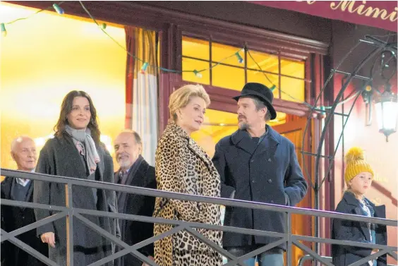  ?? Image / IFC Films via AP ?? Catherine Deneuve with Ethan Hawke, Juliette Binoche (left) and Cle´ mentine Grenier in a scene from The Truth.