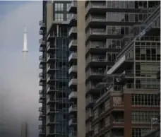 ?? COLE BURSTON/THE CANADIAN PRESS FILE PHOTO ?? In Toronto, which accounted for 72 per cent of second-quarter condo sales, the average price was $566,513, according to the latest TREB figures.