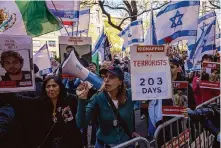  ?? ?? Pro-Israel demonstrat­ors gather for a “Bring Them Home Now” rally on Friday outside Columbia University.
