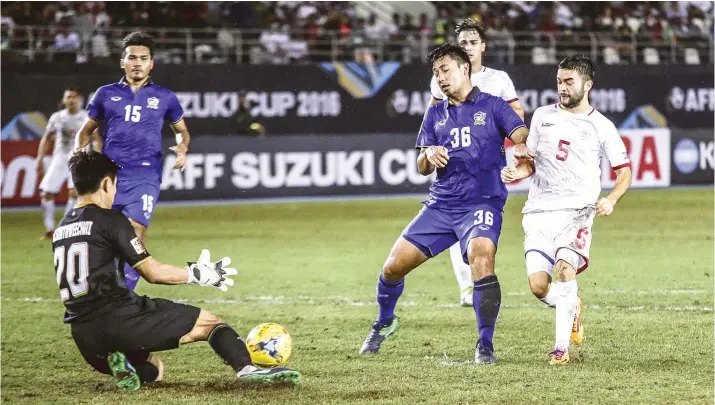  ?? SUNSTAR FILE ?? HERO OF THE MATCH. Mike Ott’s ( far right) late goal for the Azkals allows them to keep their leadership in the AFC Asian Cup.