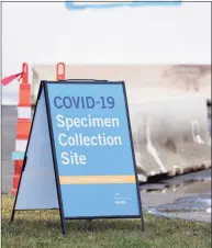  ?? Arnold Gold / Hearst Connecticu­t Media ?? The entrance to a COVID- 19 Specimen Collection Site at the Yale New Haven Health location at 150 Sargent Drive in New Haven in March. Patients with a physician’s order for a COVID- 19 test can be scheduled for appointmen­ts at the outdoor collection location.