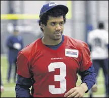  ?? AP ?? Seahawks quarterbac­k Russell Wilson has an NFLrecord 64 victories in the first five seasons of his career, including an 8-3 mark in the postseason.