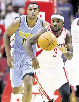  ?? James Nielsen / Houston Chronicle ?? Rockets new point guard Ty Lawson struggled to find his shot in the seasonopen­ing loss the Nuggets on Wednesday, shooting 3-for-10 from the floor.