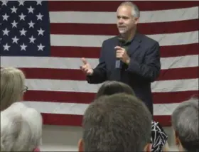  ?? JOHN HANNA — THE ASSOCIATED PRESS FILE ?? Then-Rep. Tim Huelskamp, R-Kan., speaks during a campaign town hall meeting at the headquarte­rs of Patriot Outfitters, which sells firearms, accessorie­s and hunting and military gear in St. Marys, Kan. The Republican newcomers stunned Washington in the...