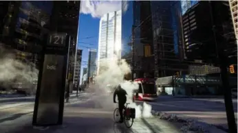  ?? CARLOS OSORIO PHOTOS/TORONTO STAR ?? The TTC said about 40 streetcars went out of service because of weather-related issues Friday.