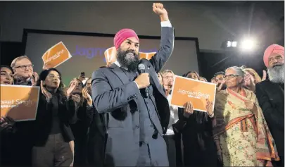  ?? CP PHOTO ?? Jagmeet Singh celebrates with supporters after winning the first ballot in the NDP leadership race to be elected the leader of the federal New Democrats in Toronto on Oct. 1.