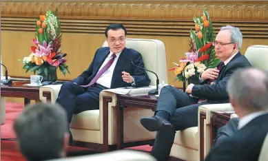  ?? WU ZHIYI / CHINA DAILY ?? Premier Li Keqiang talks at a gathering of outstandin­g foreign experts working in China on Monday in the Great Hall of the People in Beijing.