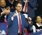  ?? SUE OGROCKI — THE ASSOCIATED PRESS ?? Oklahoma Gov. Kevin Stitt, who has tested positive for the coronaviru­s, at a campaign rally for President Donald Trump in Tulsa, Oklahoma, on June 20.