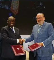  ?? ?? Above: Afreximban­k concludes a cooperatio­n agreement with Arise IIP (left) and a deal with AEE Power (right).