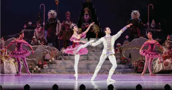  ?? Lawrence Elizabeth Knox/Houston Ballet ?? Houston Ballet soloist Aoi Fujiwara performs as the Sugar Plum Fairy and principal Connor Walsh as the Nutcracker Prince in Stanton Welch’s “The Nutcracker.”