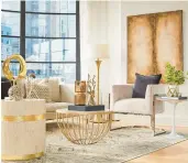  ?? SCOTT GABRIEL MORRIS/TNS ?? Deep browns and neutral earth tone creams help create a warm and inviting living space.