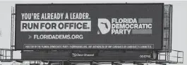  ?? STEPHEN M. DOWELL Orlando Sentinel/TNS ?? The Florida Democratic Party makes its pitch on a billboard in Longwood on April 17.