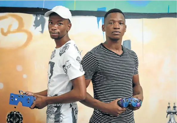  ?? Pictures: Sebabatso Mosamo/Sunday Times ?? Siphamandl­a Mqcina, 21, and Philanjalo Ndlovu, 26, recently came in the top 10 in a global technology competitio­n featuring students from 27 countries.