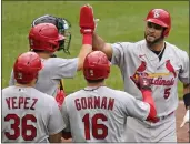  ?? GENE J. PUSKAR — THE ASSOCIATED PRESS ?? St. Louis Cardinals’ Albert Pujols returns to the dugout after hitting a three-run home run off Pittsburgh
Pirates pitcher Josh VanMeter during the ninth inning in Pittsburgh on Sunday.