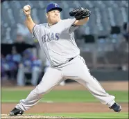  ?? MARCIO JOSE SANCHEZ — THE ASSOCIATED PRESS ?? Well-traveled Bartolo Colon, now with the Rangers, was back in Oakland to face the A’s on Monday night at the Coliseum.