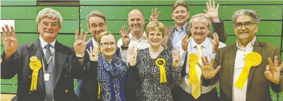  ?? Picture: Phil Creighton ?? Wokingham Lib Dem leader Lindsay Ferris (far left) with seven of his new borough councillor­s