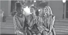  ??  ?? Gina Rodriguez, center, stars as Jenny along with close friends played by DeWanda Wise and Brittany Snow in “Someone Great.”