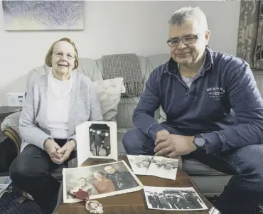  ?? PHOTOS BY ALLAN MCKENZIE ?? FAMILY PHOTOS: Beverly Greenwood and her son Mark at her home in Cleckheato­n.