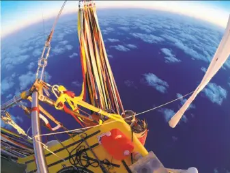  ?? Two Eagles Balloon Team ?? The helium-filled balloon carrying Troy Bradley of Albuquerqu­e and Russian Leonid Tiukhtyaev lands safely off Mexico. They crossed the Pacific Ocean after taking off from Saga, Japan.