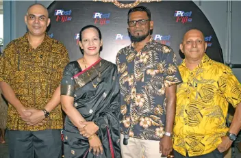  ?? Photo: Ronald Kumar ?? Post Fiji long serving staff (from left) Dharmend Chand (26 years of service), Anjani Singh (27 years of service), Shiek Farok (24 years of service) and Mukesh Chand (30 years of service) during Post Fiji 150th anniversar­y celebratio­ns at Vodafone Arena on 18 December, 2021.