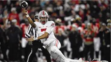  ?? NICK WASS / ASSOCIATED PRESS ?? Ohio State quarterbac­k C.J. Stroud (7) has thrown for 3,340 yards and 37 touchdowns this season. He was named the Big Ten offensive player of the year on Wednesday.