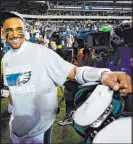  ?? Chris Szagola The Associated Press ?? Jalen Hurts celebrates after his Eagles rolled in the NFC title game.