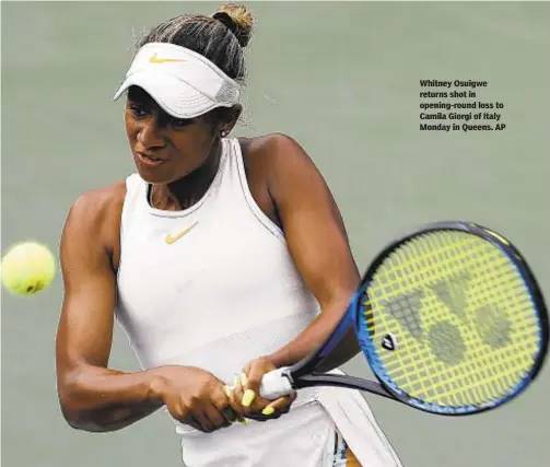  ?? AP ?? Whitney Osuigwe returns shot in opening-round loss to Camila Giorgi of Italy Monday in Queens.