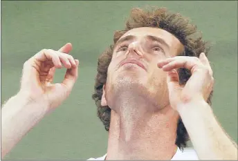  ??  ?? After beating Novak Djokovic, Andy Murray basks in the moment of his first Grand Slam title. | AP