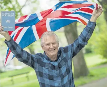  ?? Picture: Peter Langdown ?? Michael Portsmouth with his 70-year-old Queen’s coronation book.