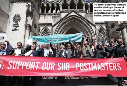  ?? Yui Mok/2021/PA ?? >
Former post office workers outside the Royal Courts of Justice, London, after their conviction­s were overturned by the Court of Appeal
