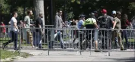  ?? MICHAEL DWYER — THE ASSOCIATED PRESS ?? Dozens of rallygoers gathered Saturday on Boston Common, but then left less than an hour after the event was getting underway.