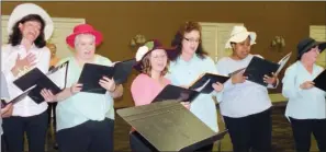  ?? CAROL ROLF/CONTRIBUTI­NG PHOTOGRAPH­ER ?? Members of the Conway Women’s Chorus’ World War I Ensemble sing “Oh Johnny, Oh Johnny, Oh!” during a preview of their Sunday concert. Vocalists include, from left, Melissa Stiller, Julie Crain, Mimi Carlin, Lisa Bouabedi, Kendra Thomas and Teena...