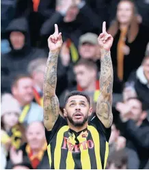  ??  ?? WATFORD’S Andre Gray celebrates scoring their second goal. |