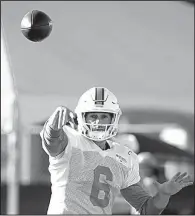  ?? AP/ LYNNE SLADKY ?? Miami Dolphins quarterbac­k Jay Cutler goes through drills with his new team Tuesday. The Dolphins signed Cutler, who had retired in the offseason, to a one- year contract Sunday.