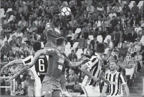  ?? Photo: IC ?? Napoli defender Kalidou Koulibaly heads the last-gasp winner against Juventus in their Italian Serie A match on Sunday in Turin, Italy.