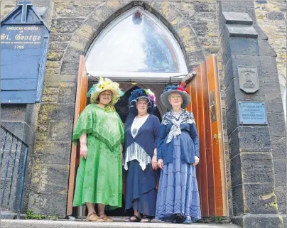  ?? DAVID JALA/CAPE BRETON POST ?? Volunteers at St. George’s Anglican Church were back at the historic north end Sydney building on Wednesday, a day after showing up at a CBRM council meeting in their Edwardian attire. Council approved a motion that registers the 232-year-old church...