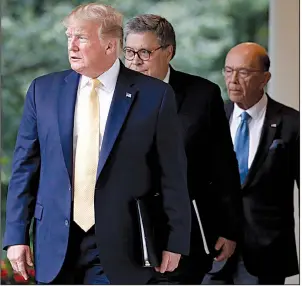 ?? AP/ALEX BRANDON ?? President Donald Trump, followed by Attorney General William Barr and Commerce Secretary Wilbur Ross, arrives Thursday at the White House Rose Garden. Trump said his political opponents were “trying to erase the very existence of a very important word and a very important thing, citizenshi­p.”