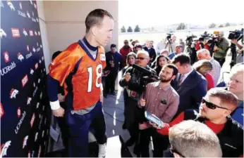  ??  ?? ENGLEWOOD: Denver Broncos quarterbac­k Peyton Manning takes the podium to respond to questions after an NFL football practice at the team’s headquarte­rs. —AP