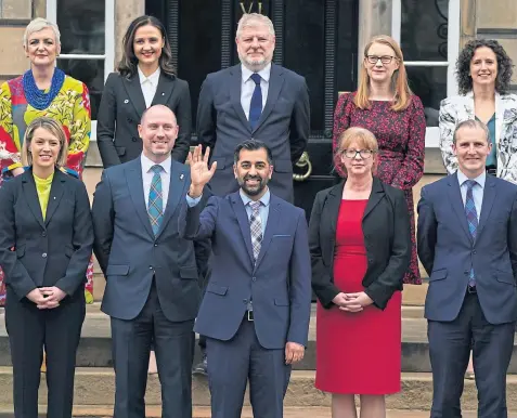  ?? Picture Andrew Milligan ?? Humza Yousaf with his new Cabinet outside Bute House