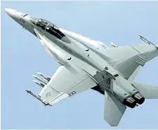  ?? THE CANADIAN PRESS FILES ?? A Boeing F-18 Super Hornet performs at an air show north of Paris in 2007.